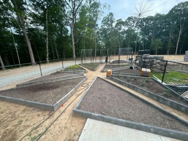 Garden beds and path filled with soil