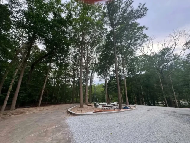 Gravel turnaround with a planted island