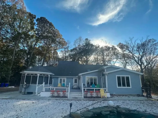 Back of the house with the deck and screened gazebo