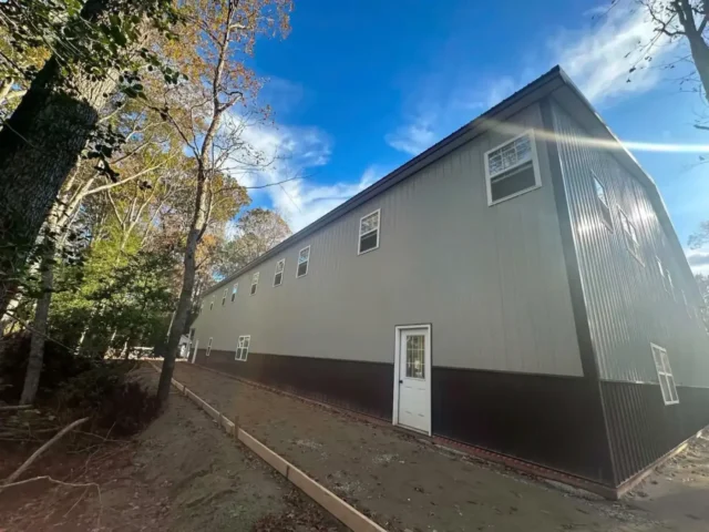 Long side of the pole building with a form-edged walk